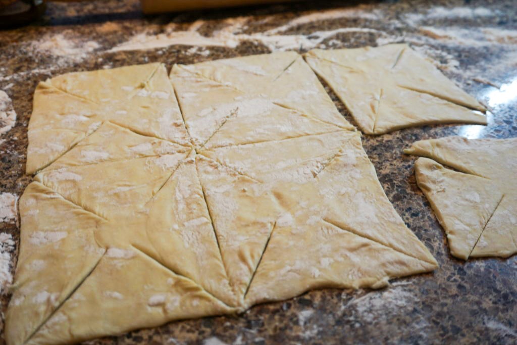 slicing the puff pastry with a pairing knife