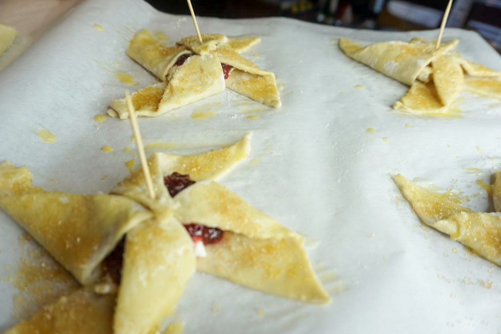 before baking the puffy pastry pinwheels 