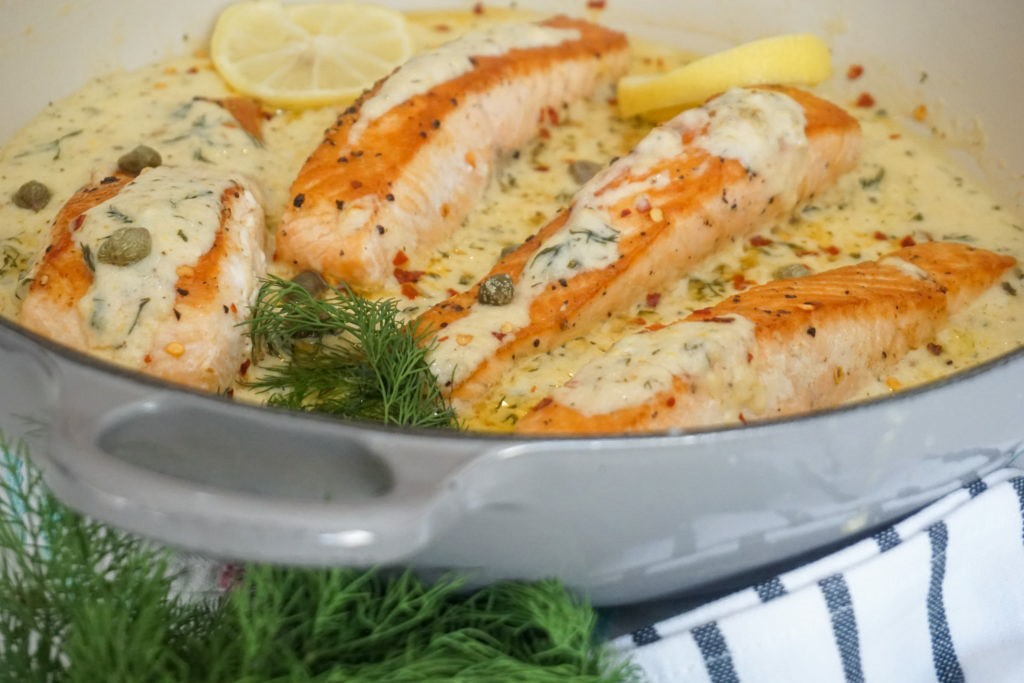 overlook of a fish dish with fresh dill