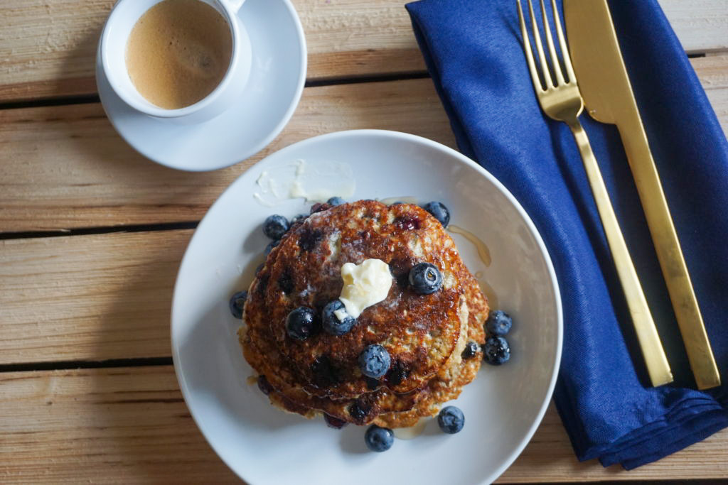 the sunday funday brunch special with oatmeal blueberry pancakes and coffee 