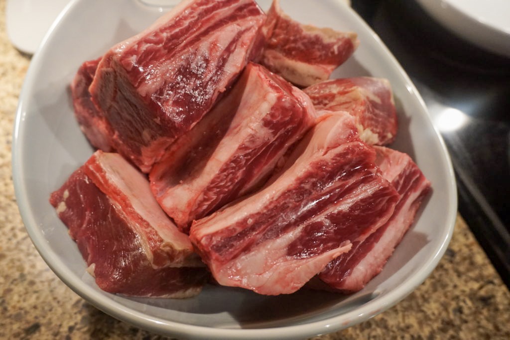 Close up of the uncooked short ribs