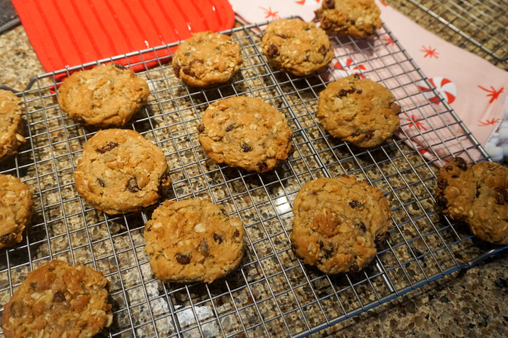 oatmeal raisin cookies on a cooling rack