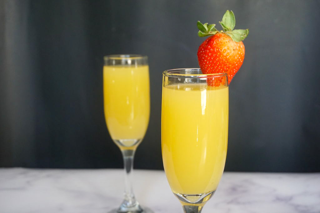 Mimosa with a strawberry