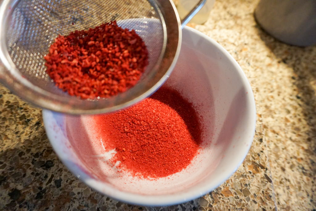 Sifting the raspberry freeze-dried powder