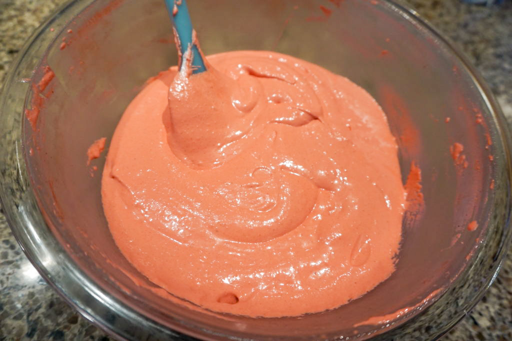 Mixing together the meringue and dry ingredients