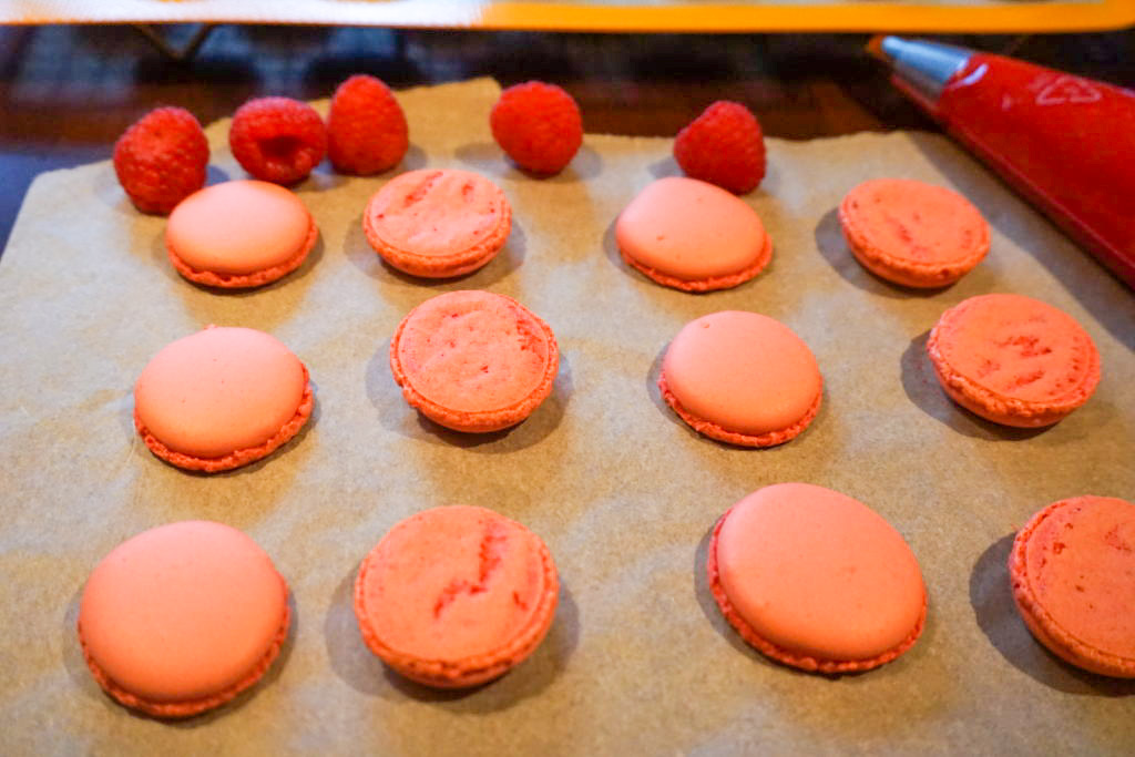 Beginning the process of filling and putting together the macarons