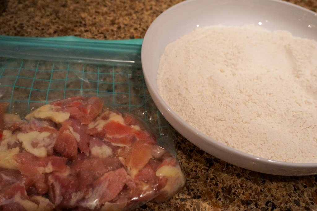 flour mixture and chicken thighs