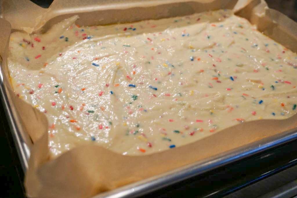 baking the quarter size funfetti sheet cake 