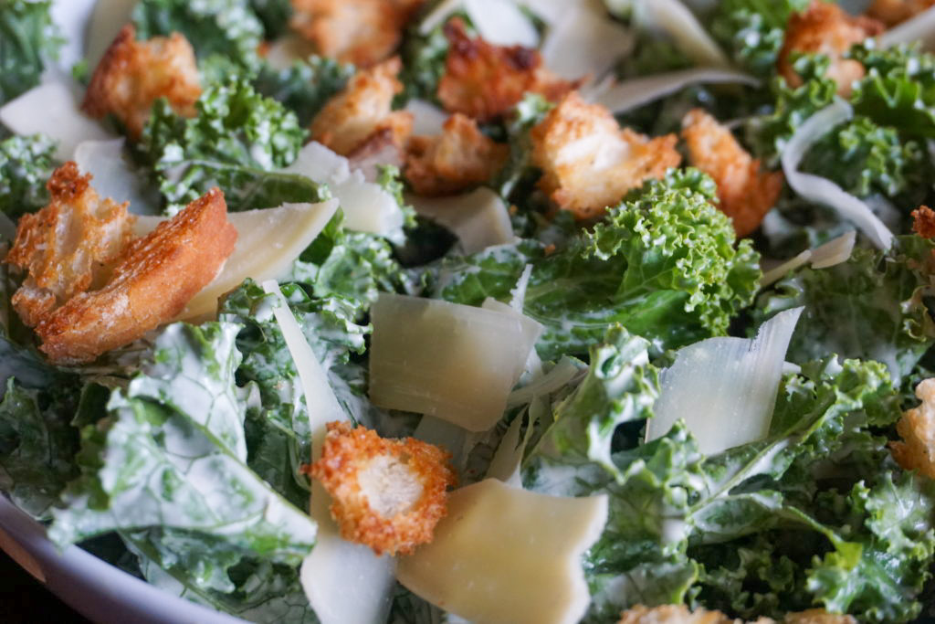 Close-up of a Kale caesar salad with homemade croutons