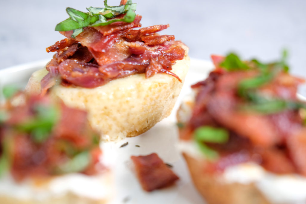 close-up of the bacon on top of the crostini