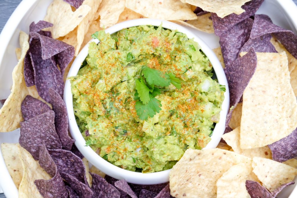 close-up of the guacamole with tortilla chips
