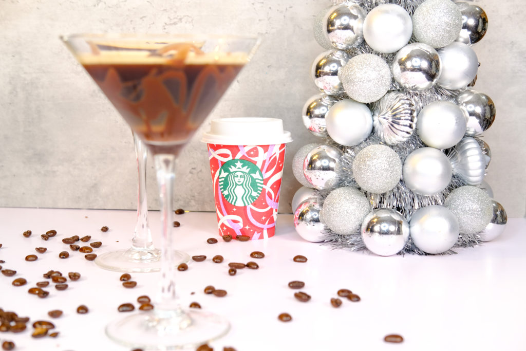 espresso martini with espresso from Starbucks and silver Christmas ornament tree