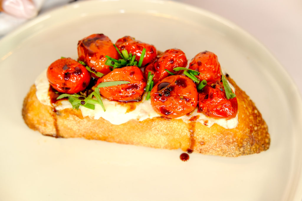 close-up of the burrata and roasted tomato bread