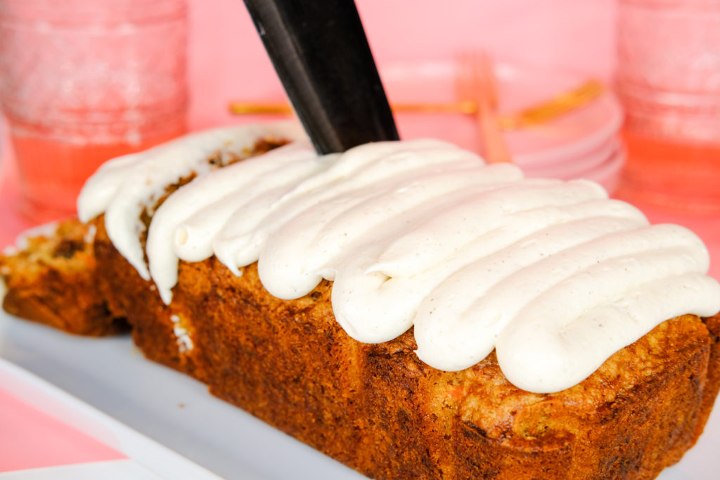 cutting into the carrot pound cake